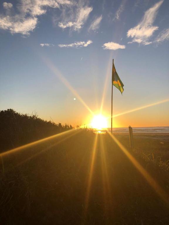 O pôr ou nascer do sol visto da pousada ou dos arredores