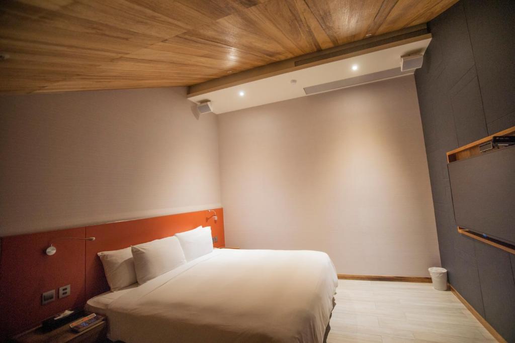 Postel nebo postele na pokoji v ubytování LE LE Motel