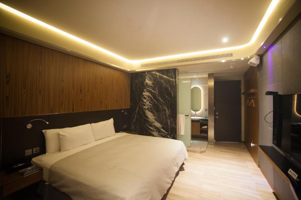 Postel nebo postele na pokoji v ubytování LE LE Motel