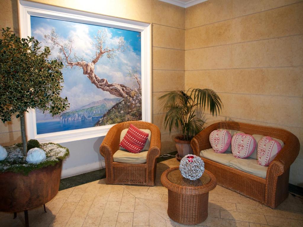 Posezení v ubytování Ulisse Deluxe Hostel