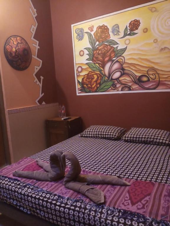 Postel nebo postele na pokoji v ubytování Losmen Setia Kawan