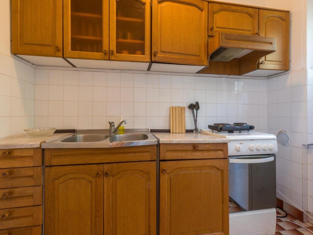 Kuchyň nebo kuchyňský kout v ubytování Apartments Alenka