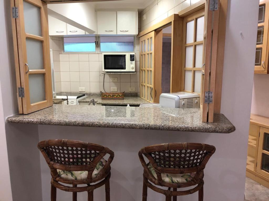  Apartamento a beira mar - Tombo - Guarujá