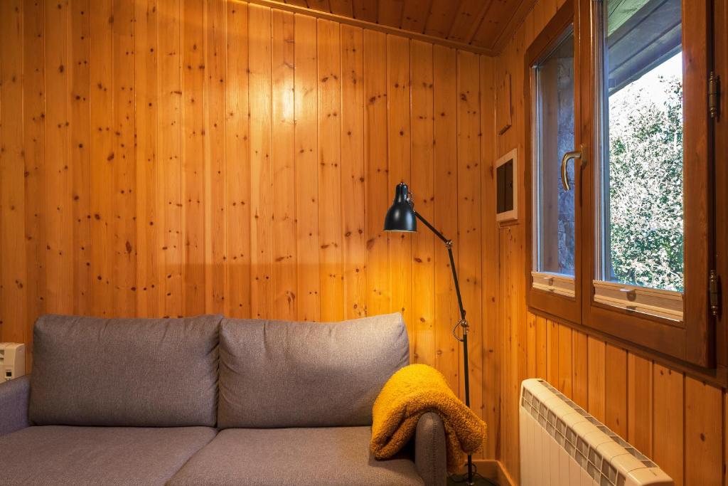 Posezení v ubytování El Refugi de les Basses Apartament