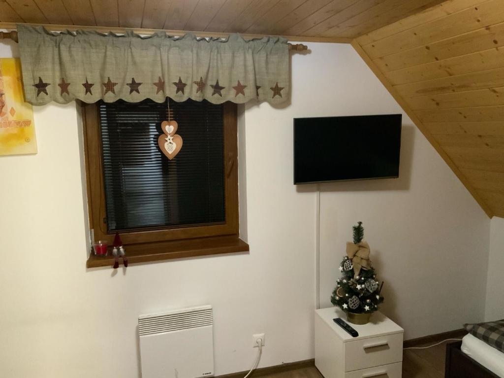 TV a/nebo společenská místnost v ubytování Villa Rocky View