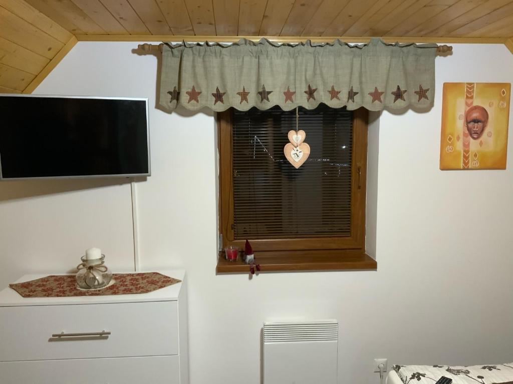 TV a/nebo společenská místnost v ubytování Villa Rocky View