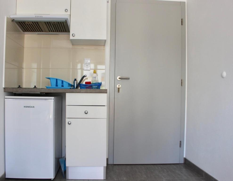 Kuchyň nebo kuchyňský kout v ubytování Filipovic Apartmani