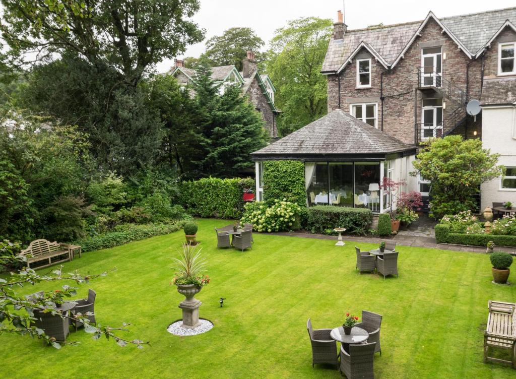 an aerial view of a garden with chairs and tables at The Grasmere Hotel in Grasmere