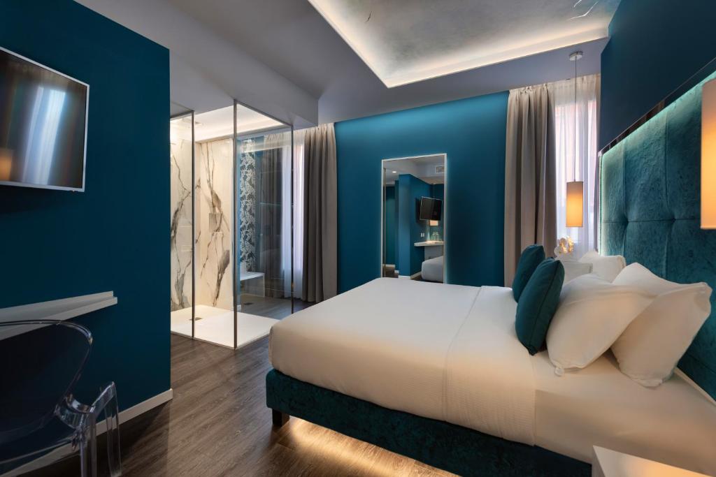 Postel nebo postele na pokoji v ubytování Hotel Locanda Al Piave ***S
