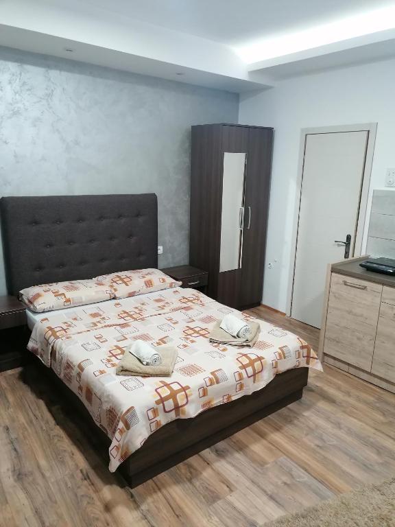 Postel nebo postele na pokoji v ubytování Prenoćište Day Holiday