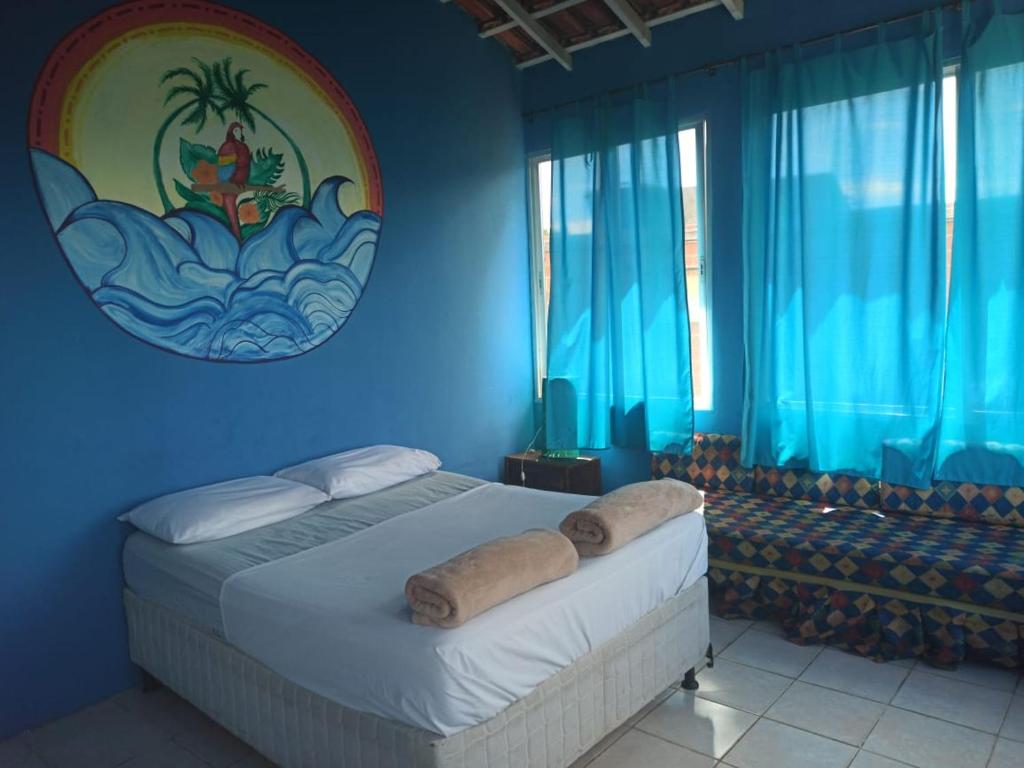 En eller flere senge i et værelse på Banana Leaf Eco Hostel