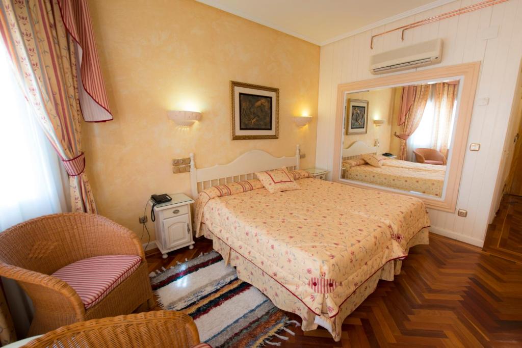 Postel nebo postele na pokoji v ubytování Los Arcos