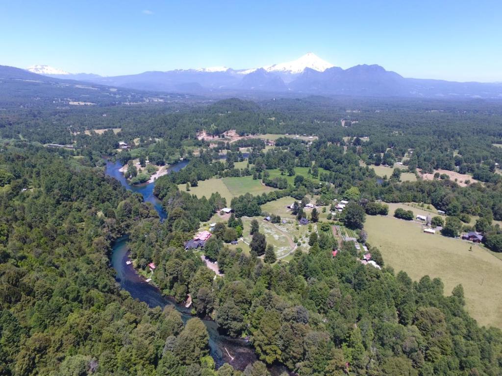 Cabañas Los Canelos Pucon, Hermosa Granja de 20 hectaréas a orillas del Río Liucura