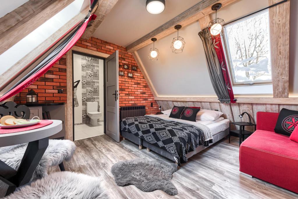 Posedenie v ubytovaní Przytulia Apartamenty i Pokoje