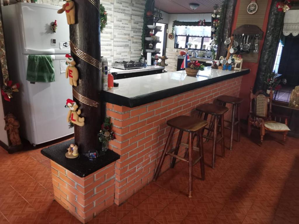Lounge nebo bar v ubytování Casa Irazú