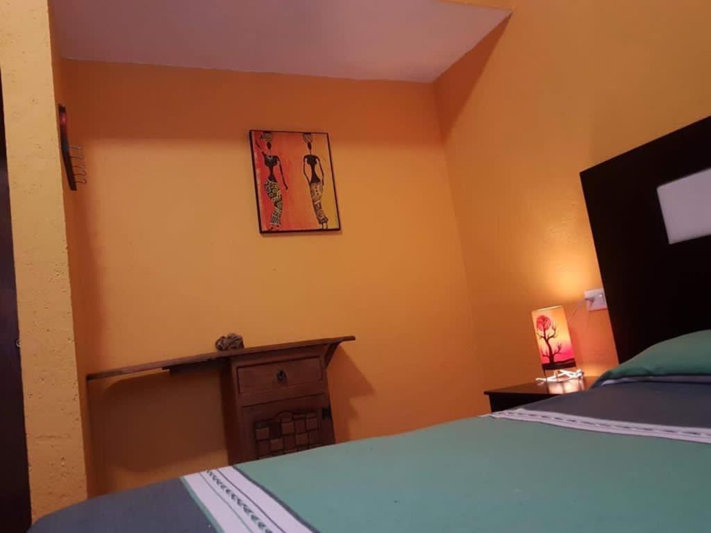 Postel nebo postele na pokoji v ubytování Posada la Natividad