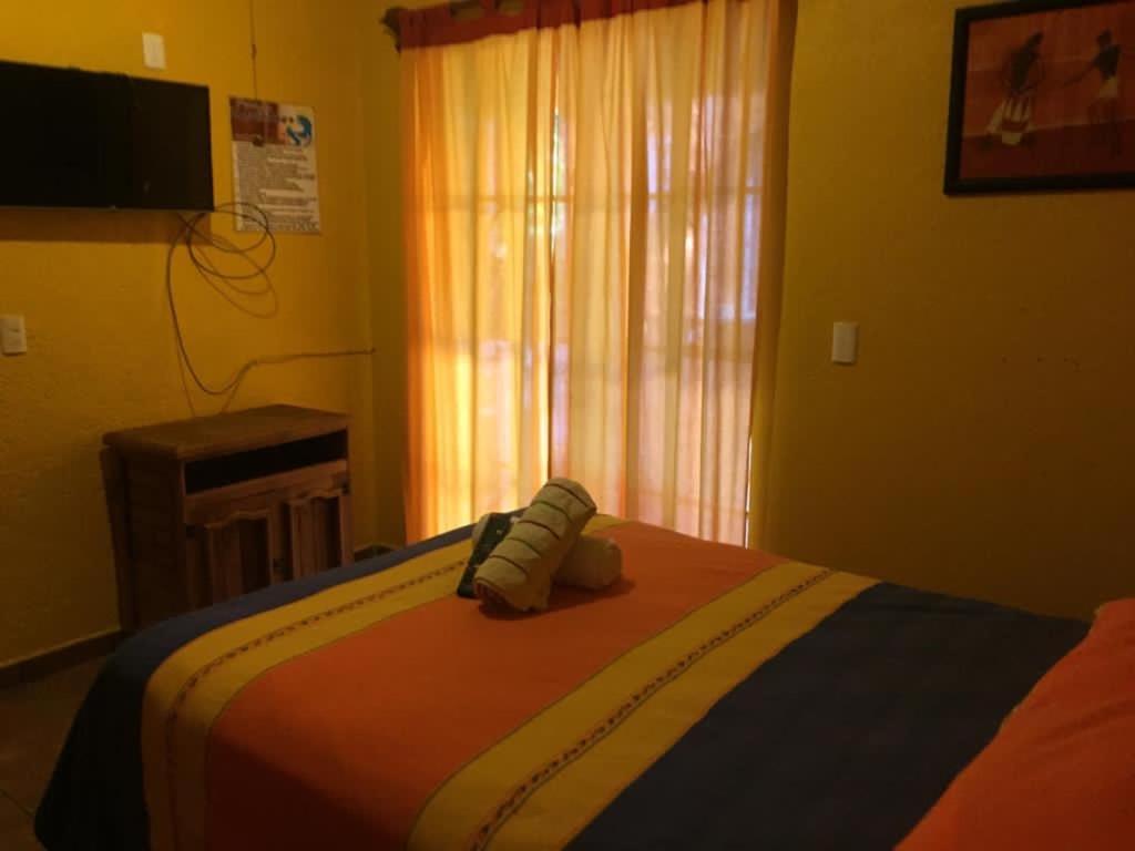 Postel nebo postele na pokoji v ubytování Posada la Natividad