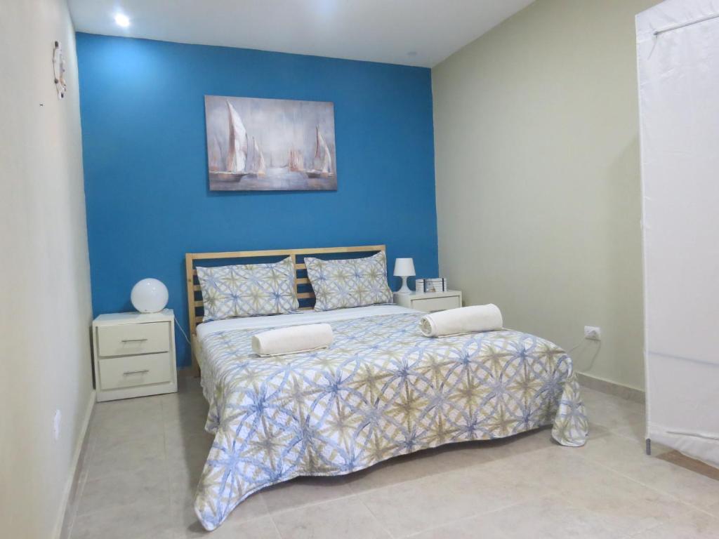 Ліжко або ліжка в номері Corales Punta Cana