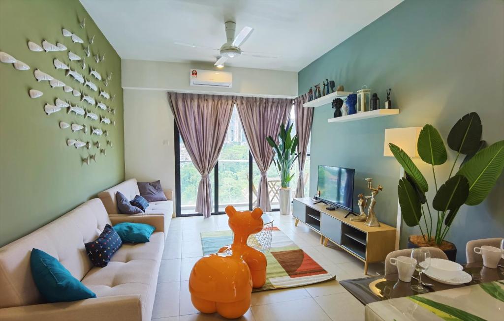 a living room with a cat statue in the middle of the room at Tropical Houz@Midhill Genting Highlands (Free Wi-Fi) in Genting Highlands