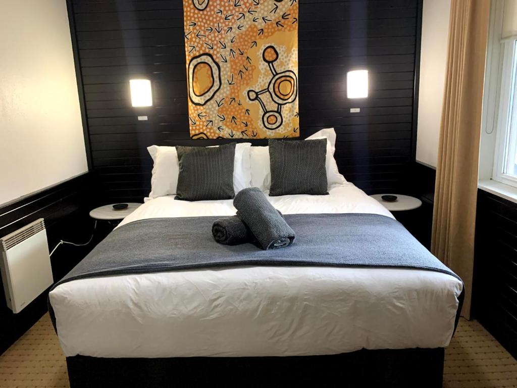 Кровать или кровати в номере Attunga Alpine Lodge & Apartments