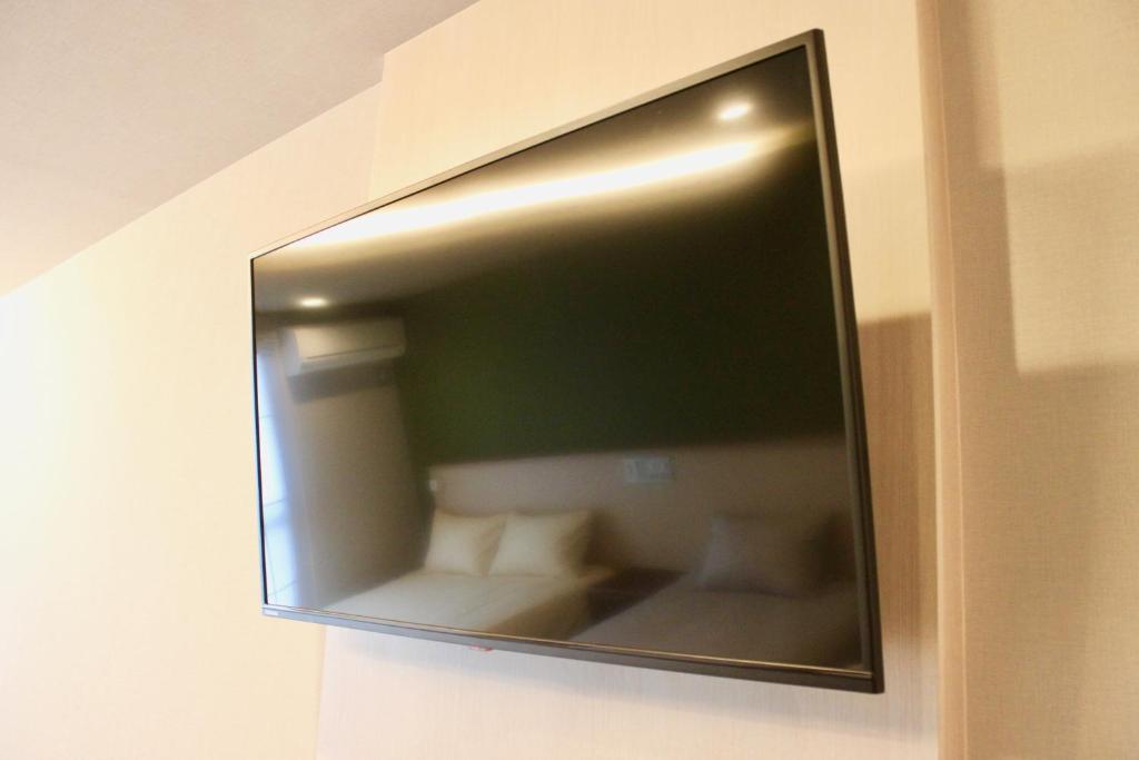 TV a/nebo společenská místnost v ubytování HIZ HOTEL Gion-Shirakawa