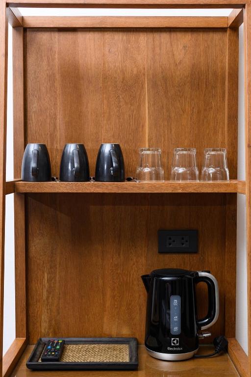 Příslušenství pro přípravu čaje a kávy v ubytování Himku Hotel - adult only