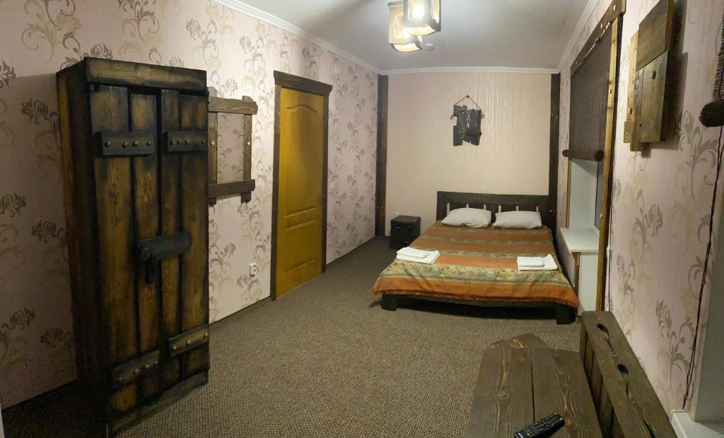 Postel nebo postele na pokoji v ubytování Yulita