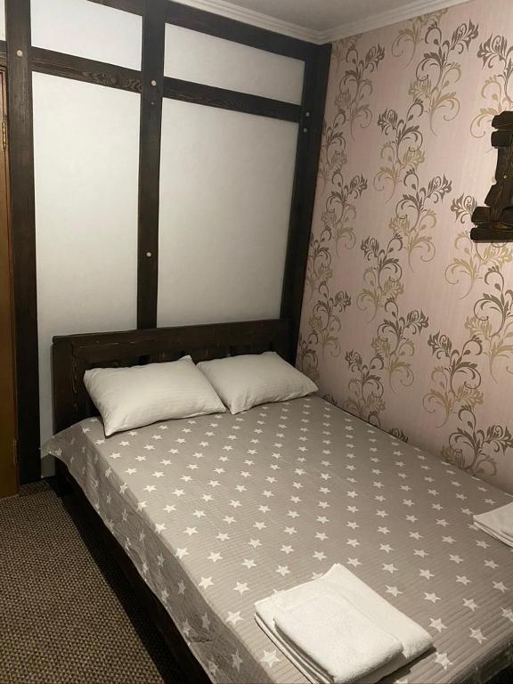 Postel nebo postele na pokoji v ubytování Yulita