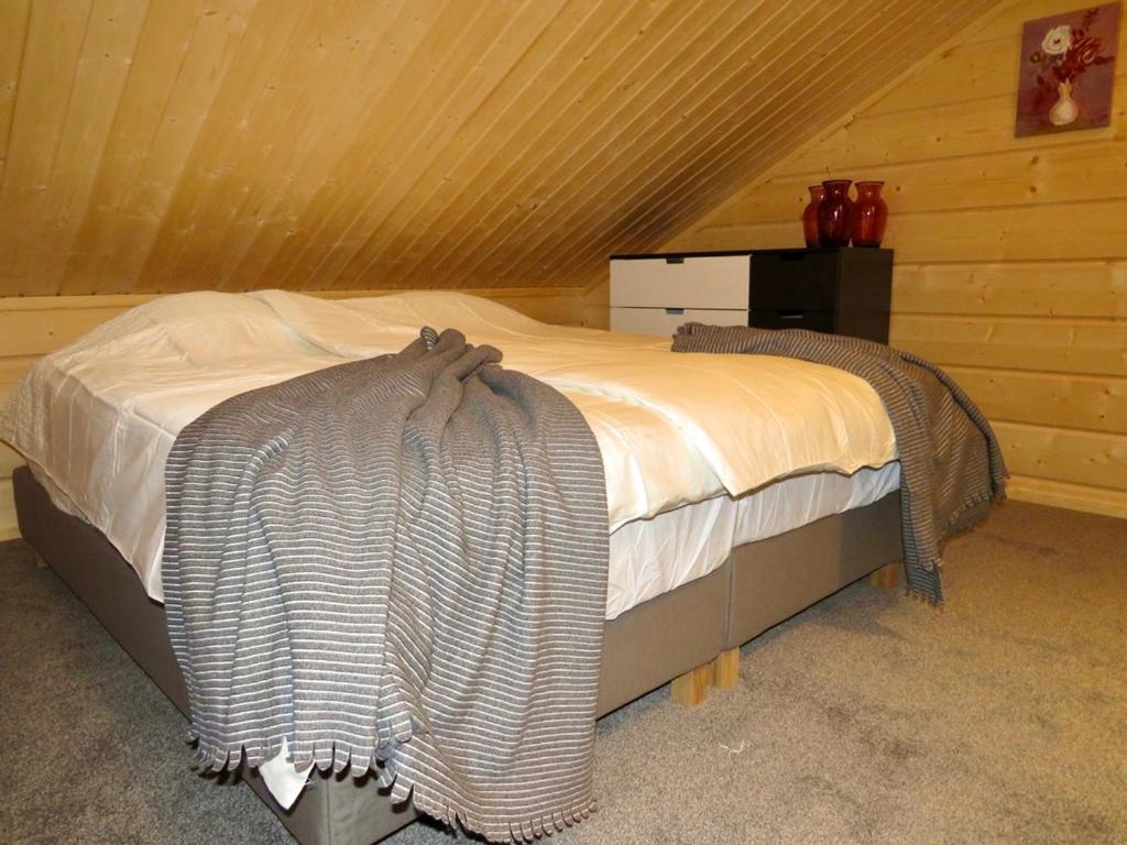 Postel nebo postele na pokoji v ubytování B&B Adventures