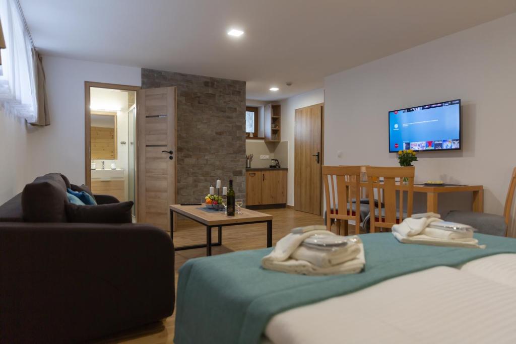 Postel nebo postele na pokoji v ubytování Darmilus apartmány