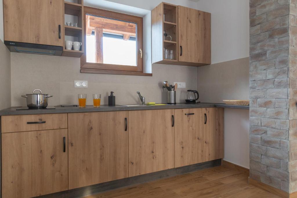 Kuchyň nebo kuchyňský kout v ubytování Darmilus apartmány