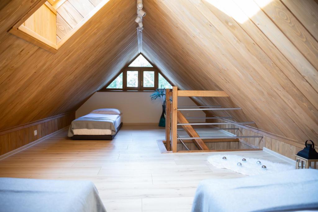 Postel nebo postele na pokoji v ubytování Darmilus apartmány