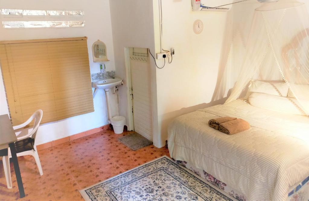 Postel nebo postele na pokoji v ubytování Dar Yasmine Motel