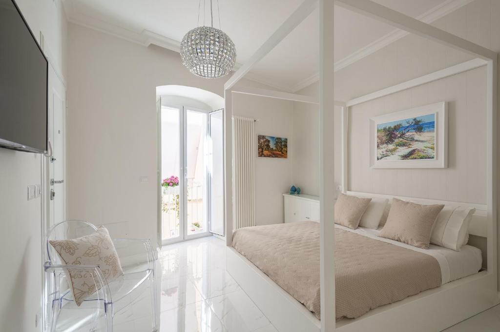 Postel nebo postele na pokoji v ubytování Porta Piccola Luxury Home