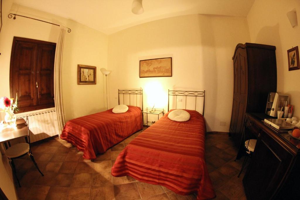 Postel nebo postele na pokoji v ubytování B&B Corte Barocca
