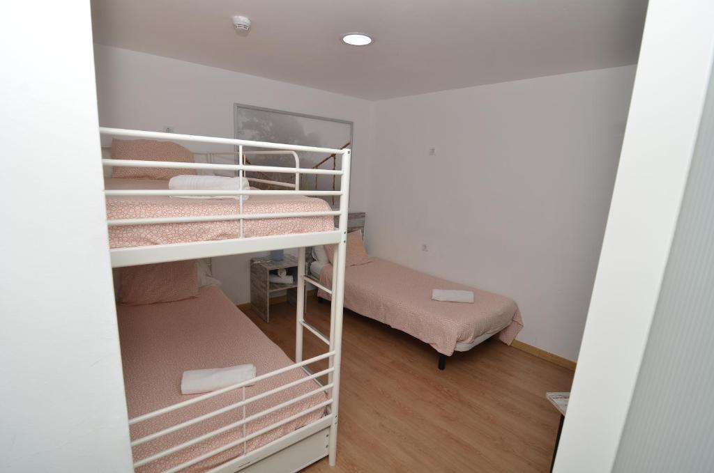 Posteľ alebo postele v izbe v ubytovaní Hotel Boutique Nomadas