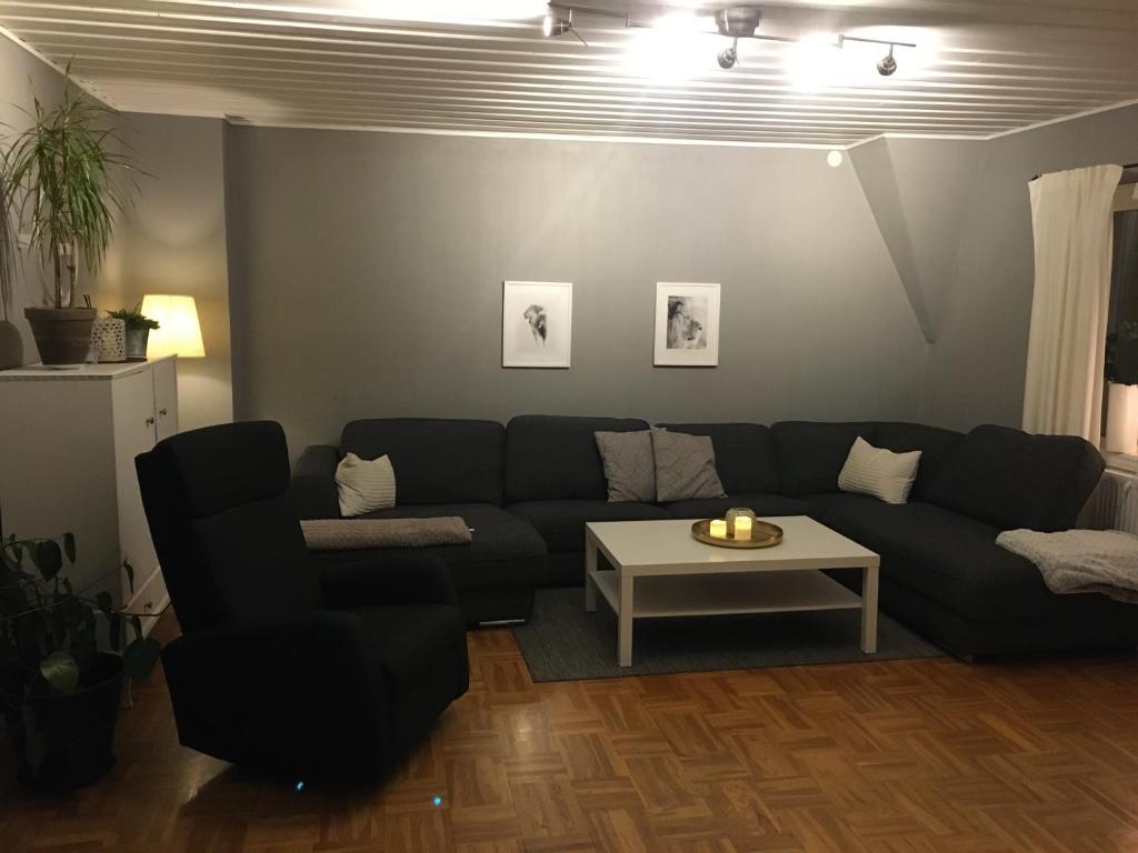 a living room filled with furniture and a couch at Nebulosavägen 20 in Sundsbruk