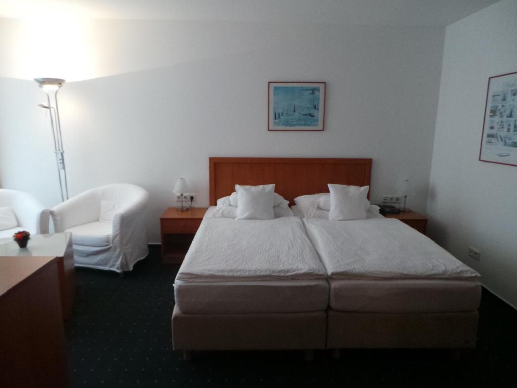 Postel nebo postele na pokoji v ubytování Haus Köbesine