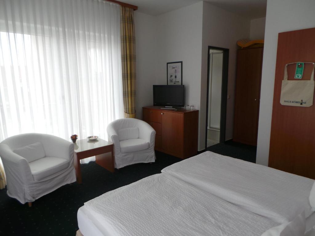 Postel nebo postele na pokoji v ubytování Haus Köbesine