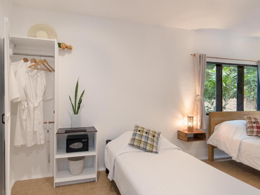 Postel nebo postele na pokoji v ubytování Granada Beach Resort - Adults Only