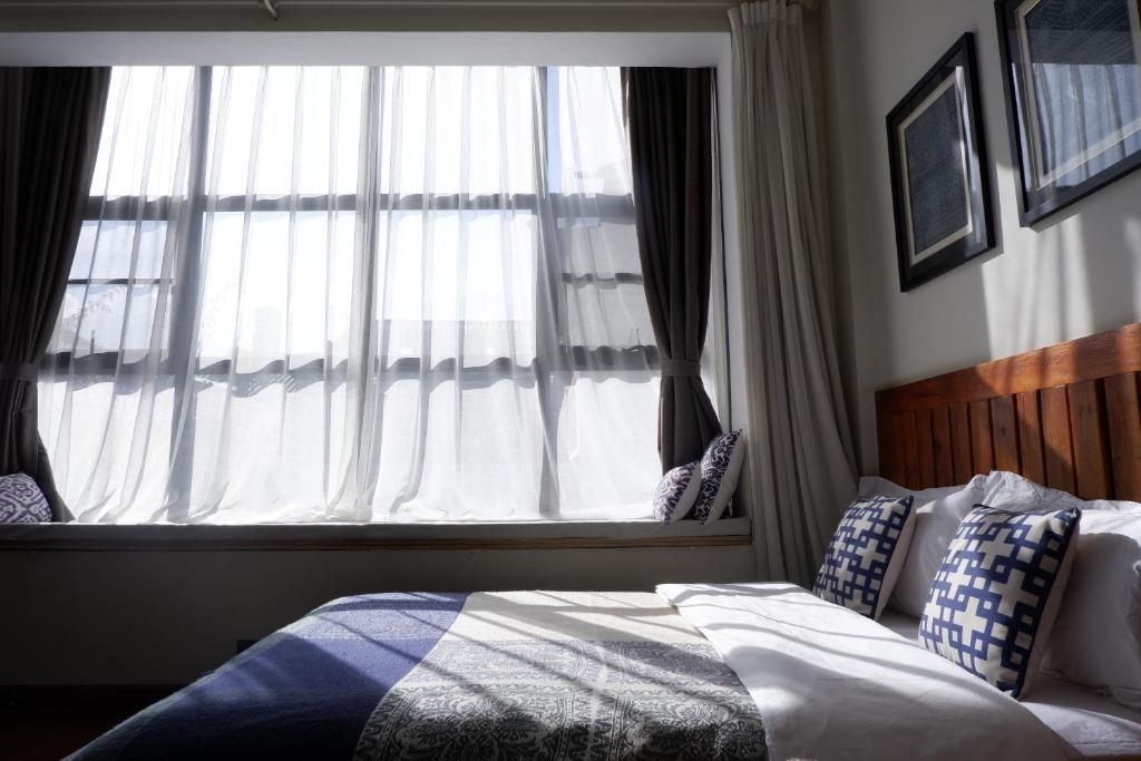 Postel nebo postele na pokoji v ubytování Dali Yunxi Boutique Inn
