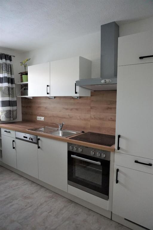 Kuchyň nebo kuchyňský kout v ubytování Haus Walser