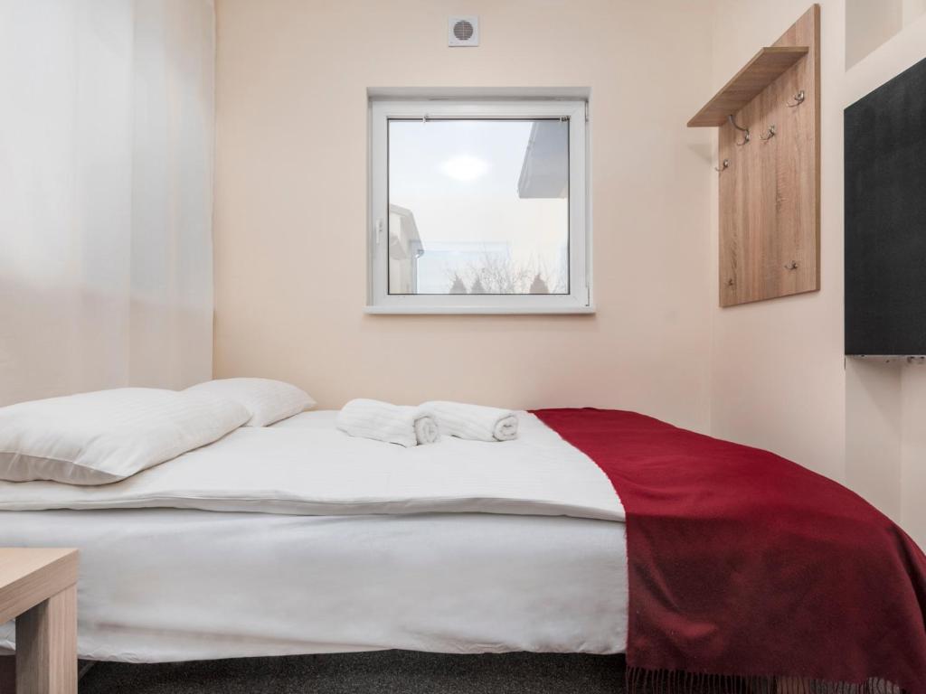 Postel nebo postele na pokoji v ubytování Luxhostel24 Warsaw