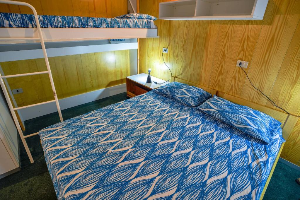 Postel nebo postele na pokoji v ubytování Res.Albarè/Solaria Apt.Solandra