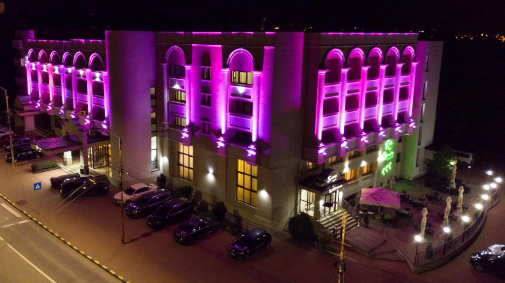 an overhead view of a building with purple and green lights at Hotel Balada in Suceava