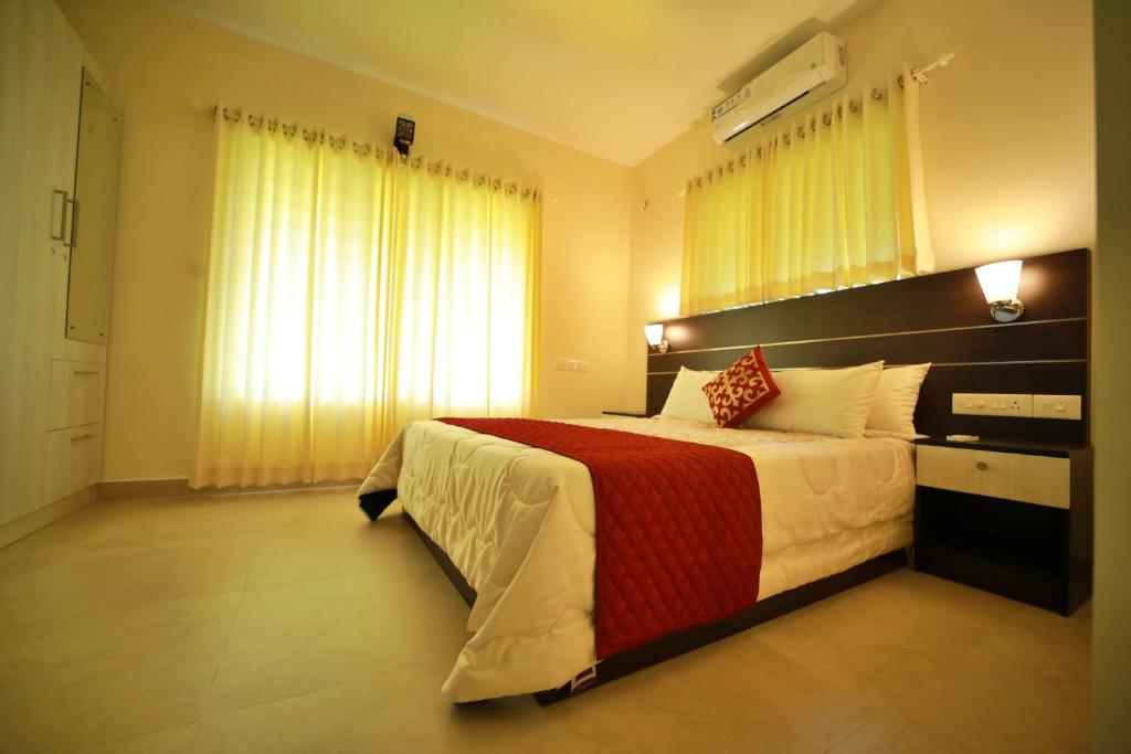 Postel nebo postele na pokoji v ubytování Green Royale Living Spaces - Luxury Serviced Apartments