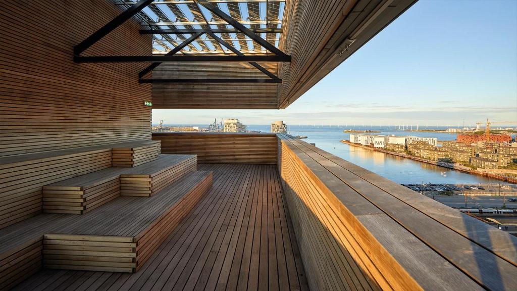 a view from the deck of a building overlooking the water at Charlottehaven in Copenhagen