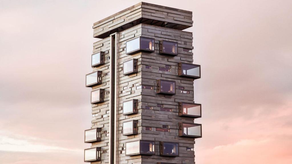 a tall building with balconies on the side of it at Charlottehaven in Copenhagen