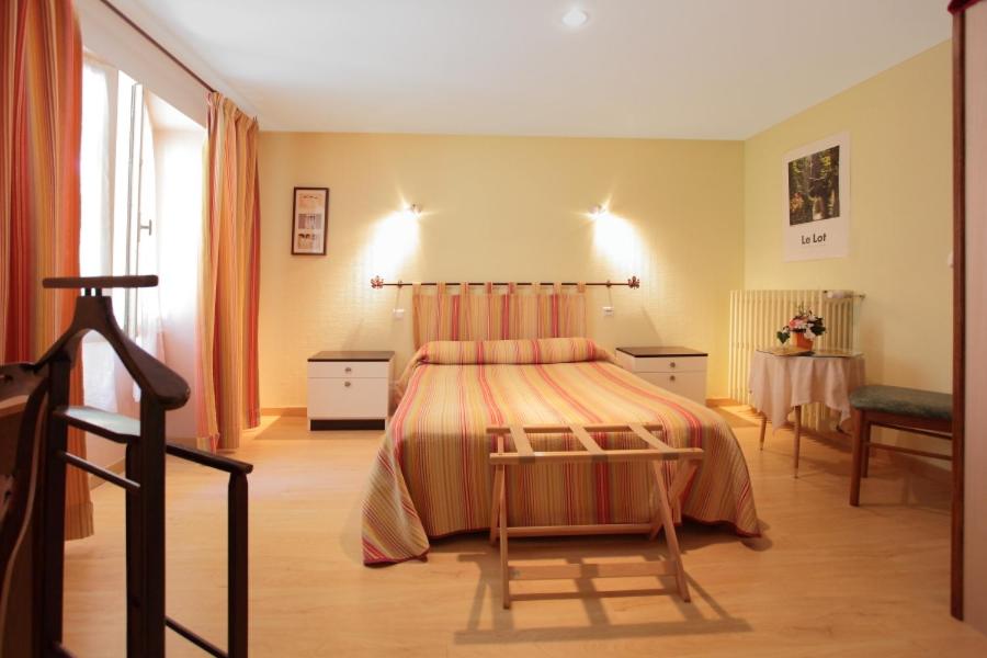 Postel nebo postele na pokoji v ubytování Hotel Colombié
