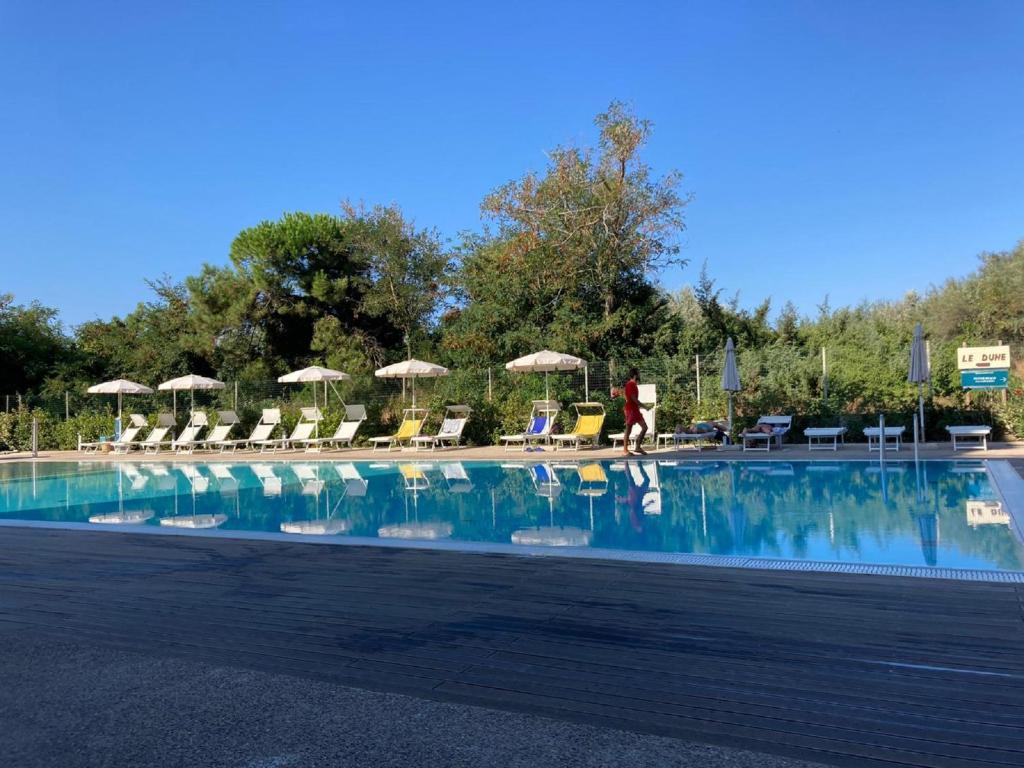Bazén v ubytování Toscana Charme Resort nebo v jeho okolí